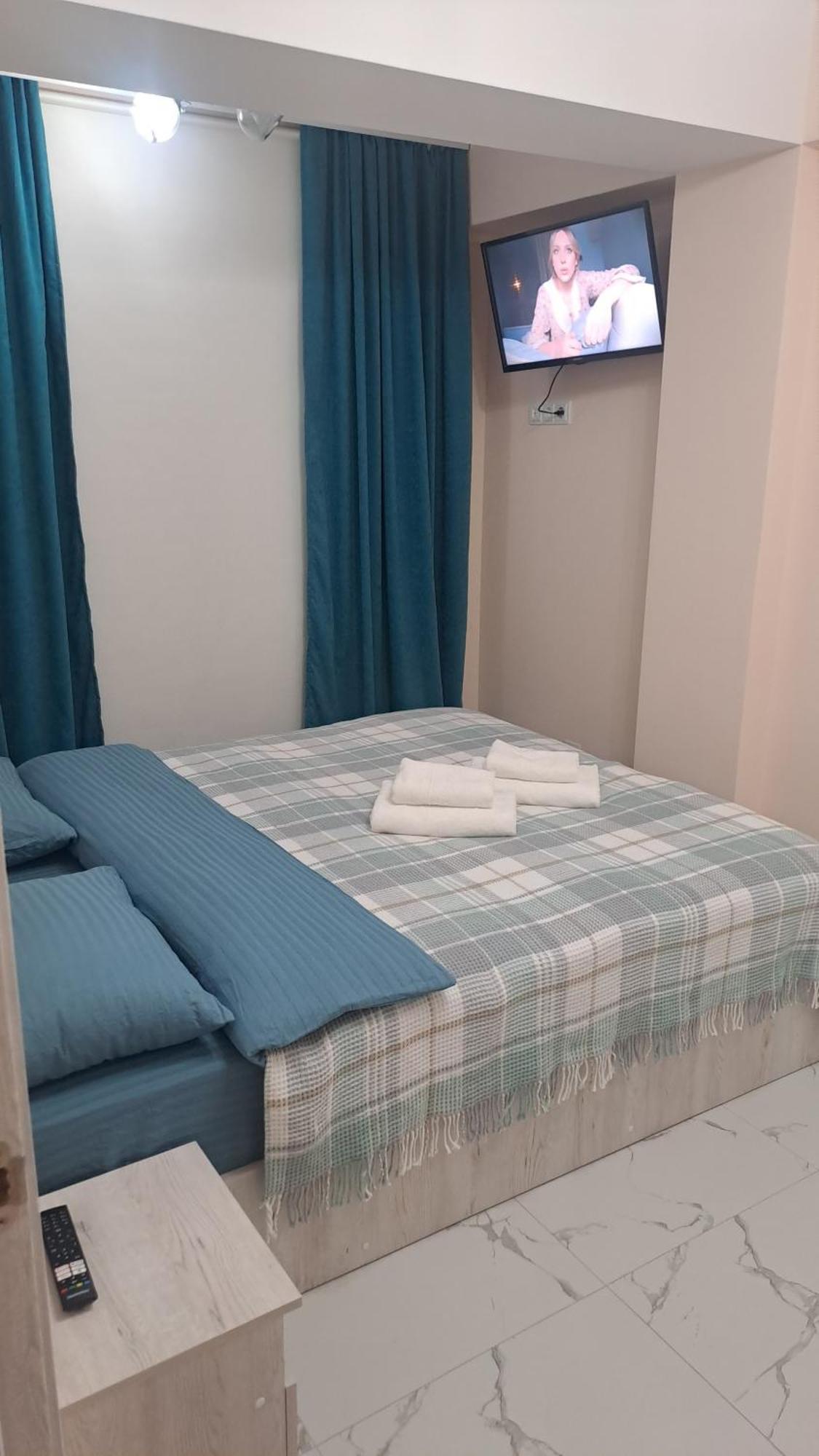 Аэропорт-Номера 24/24 . Chisinau Quarto foto